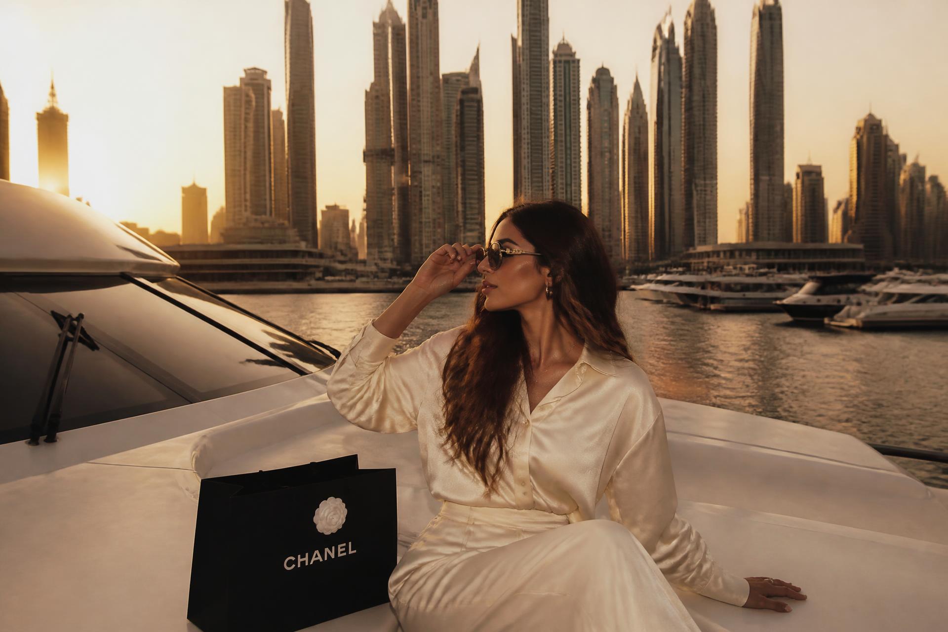 Luxury content creation day on a yacht with the Dubai Marina skyline